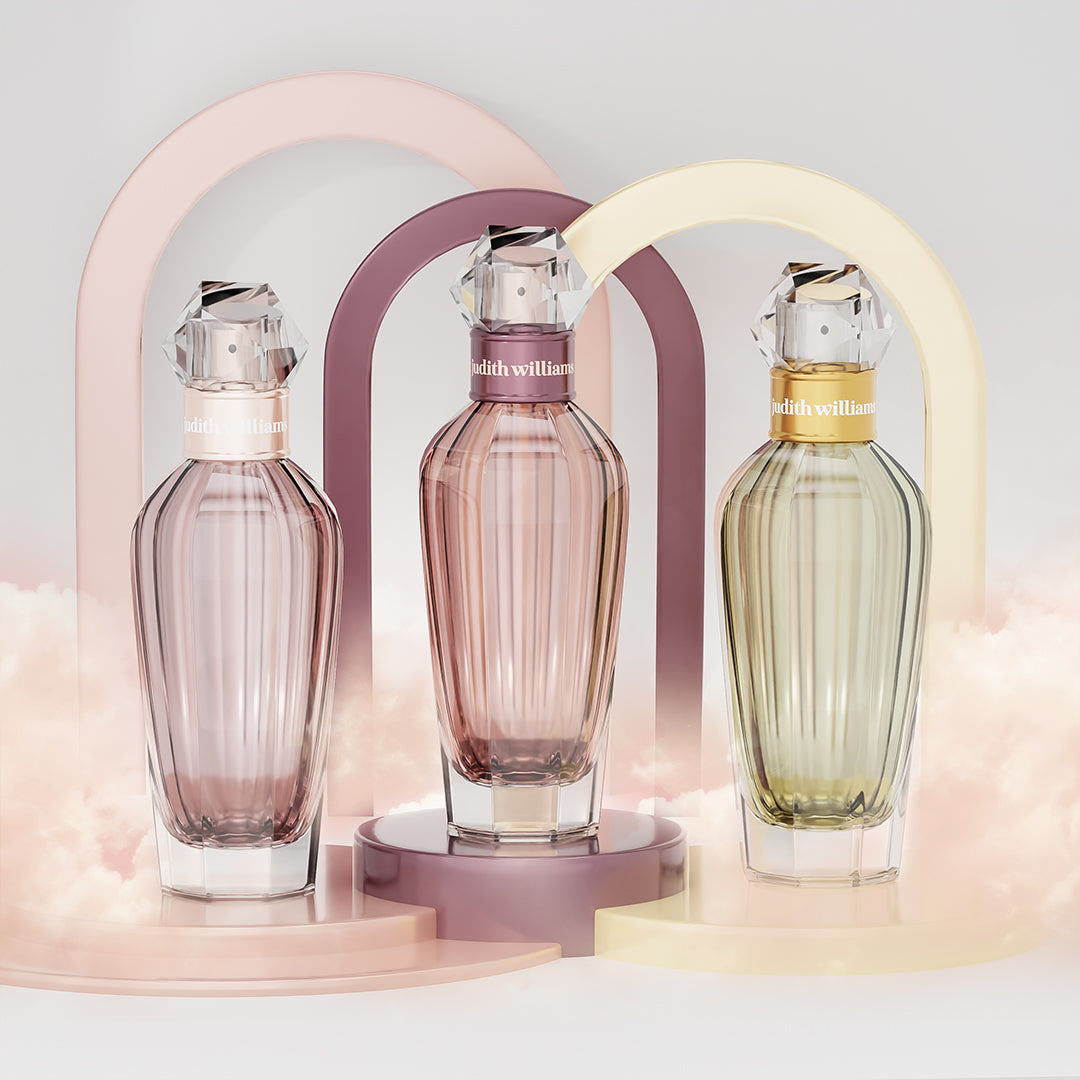 Präsentation von drei Parfümflaschen von Judith Williams Cosmetics.