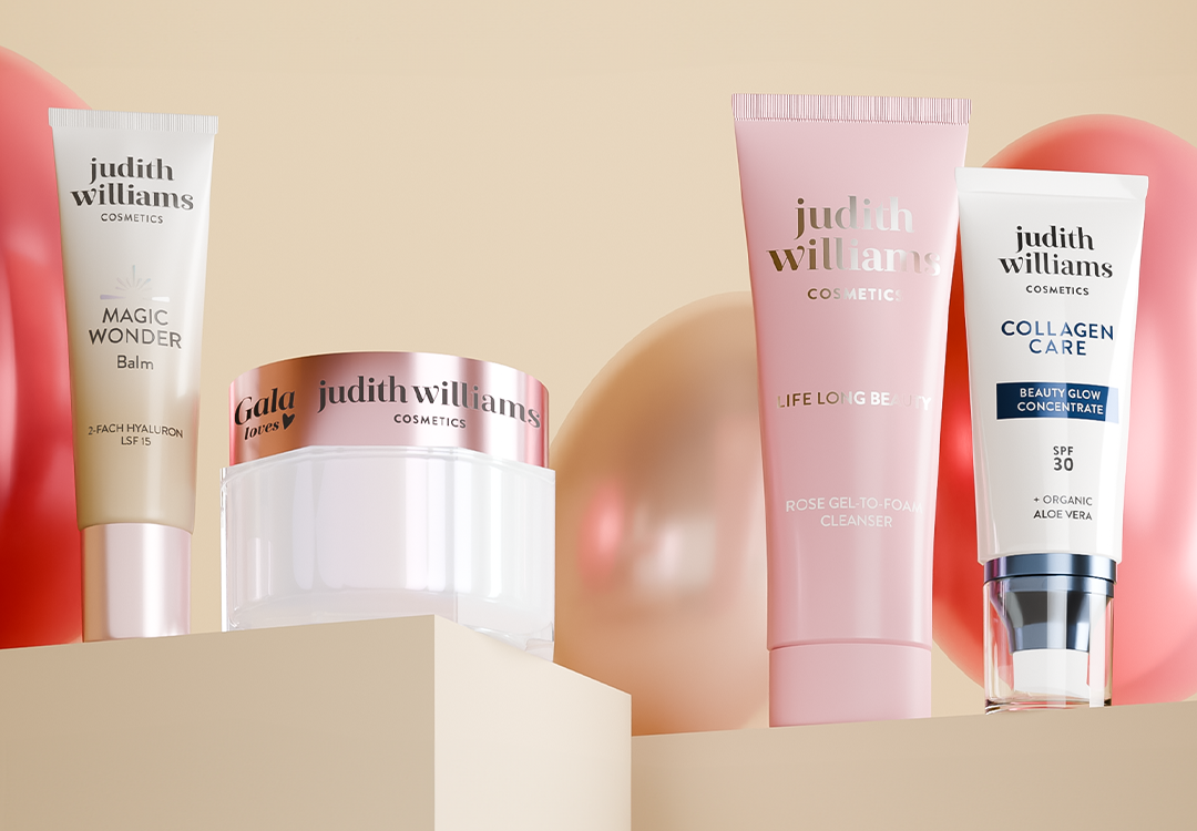Vier Produkte von Judith Williams Cosmetics mit Ostereier im Hintergrund. 